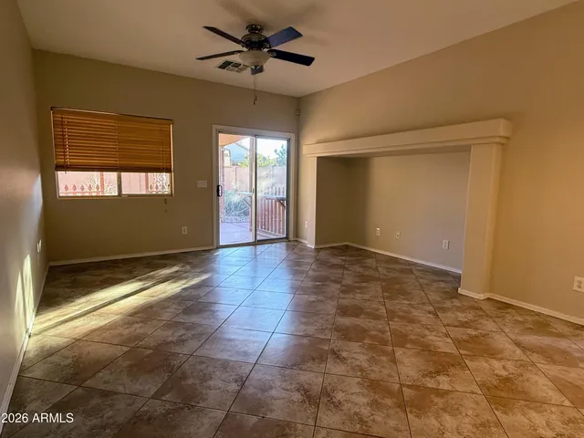 a view of an empty room and window