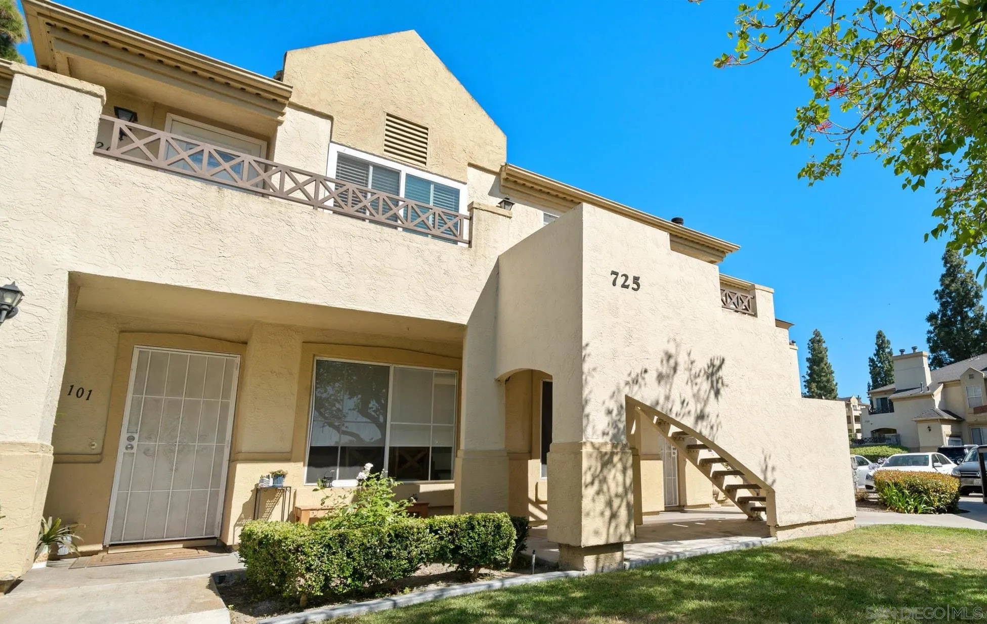 725 Brookstone Road, Unit 101 Chula Vista, CA 91913 - Photo 1 of 31 a front view of a house with a yard
