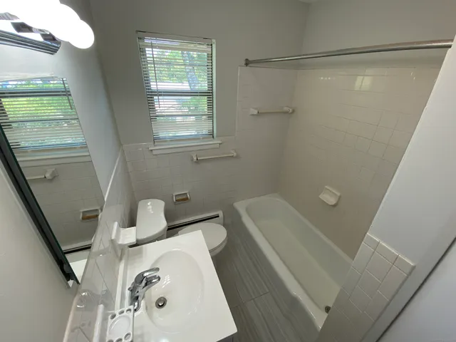 a bathroom with a sink and a tub