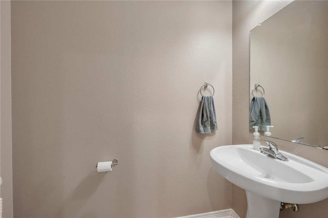 1198 Jones-Butler Road, Unit 2109 College Station, TX 77840 - Photo 5 of 16 a bathroom with a sink and mirror