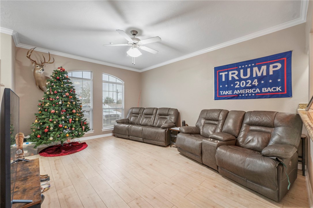 1198 Jones-Butler Road, Unit 2109 College Station, TX 77840 - Photo 6 of 16 a living room with furniture and a christmas tree