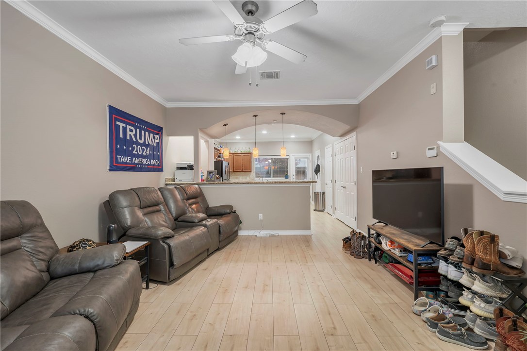 1198 Jones-Butler Road, Unit 2109 College Station, TX 77840 - Photo 7 of 16 a living room with furniture and a flat screen tv