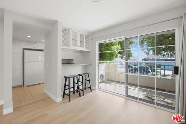 a view of a livingroom with furniture window and outside view