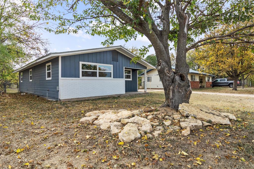 a front view of house with yard