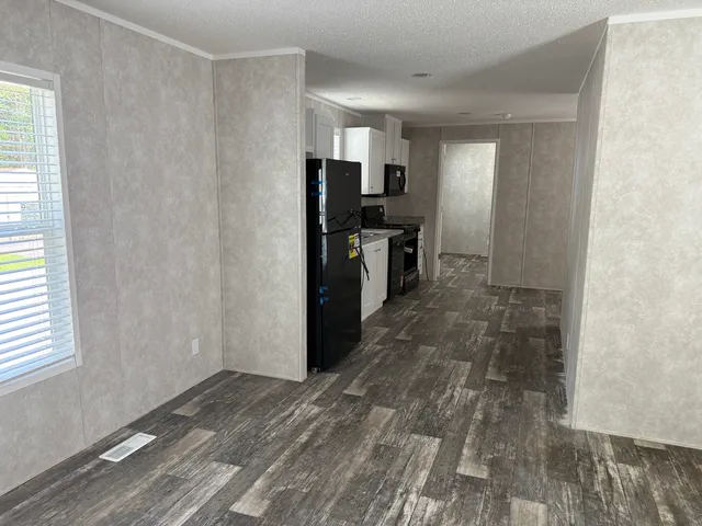 a view of a kitchen with a sink
