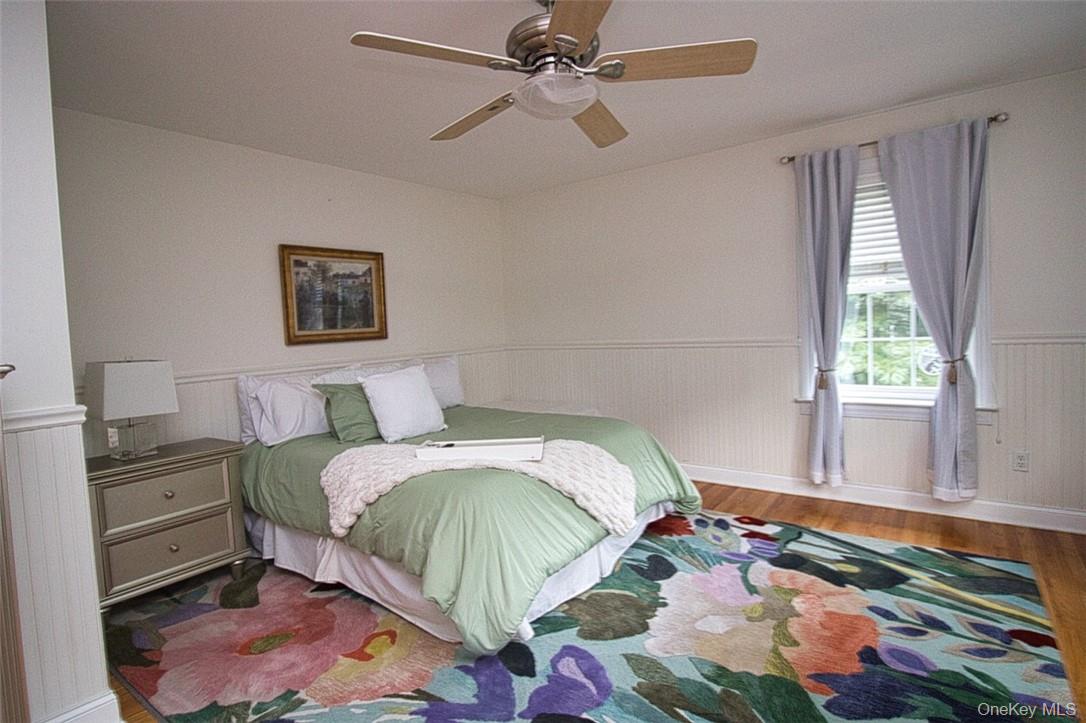 9 Roselawn Road Highland Mills, NY 10930 - Photo 28 of 46 Very spacious bedroom with big picture window overlooking gorgeous resort-style backyard, hardwood / wood-style flooring and ceiling fan