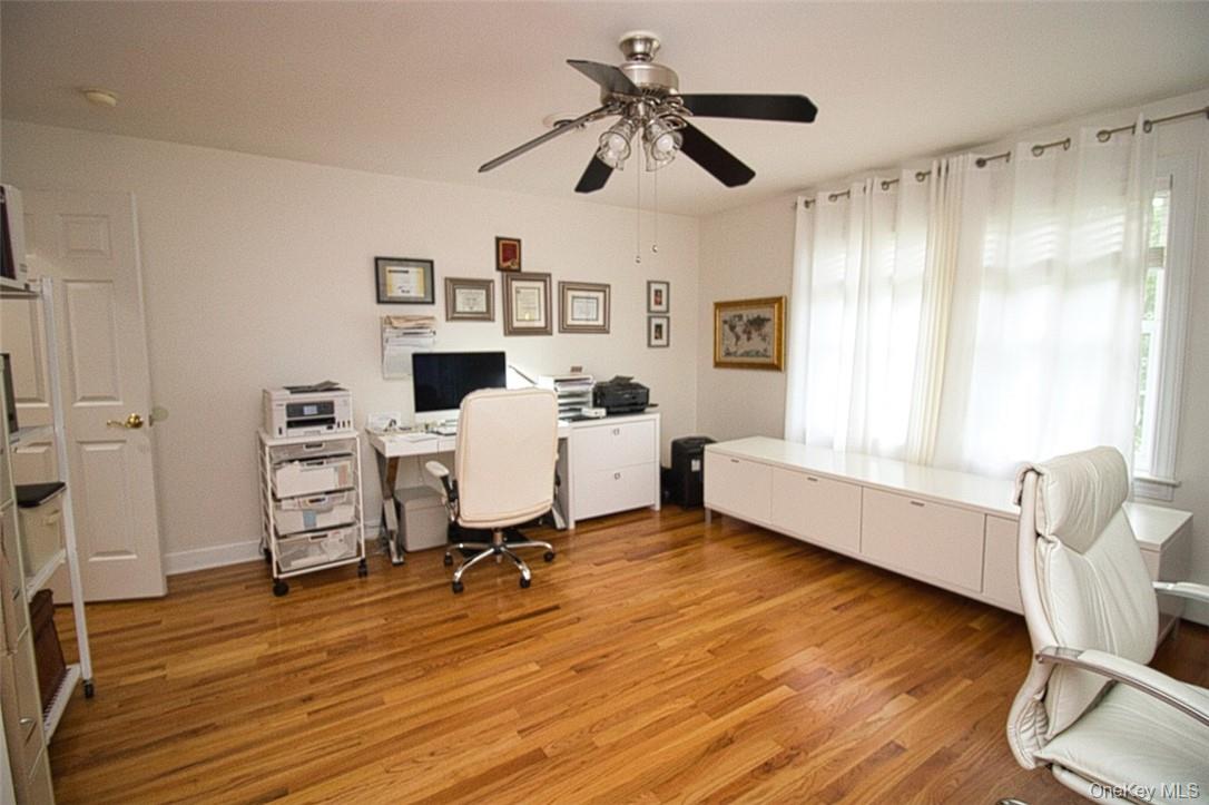 9 Roselawn Road Highland Mills, NY 10930 - Photo 29 of 46 Very large Bedroom now used as a double-office, featuring ceiling fan, a wealth of natural light, wood flooring, and large double-door closet