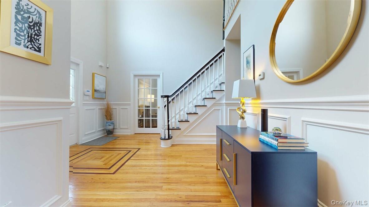 9 Roselawn Road Highland Mills, NY 10930 - Photo 3 of 46 Entryway with a towering ceiling and light hardwood / wood-style floors