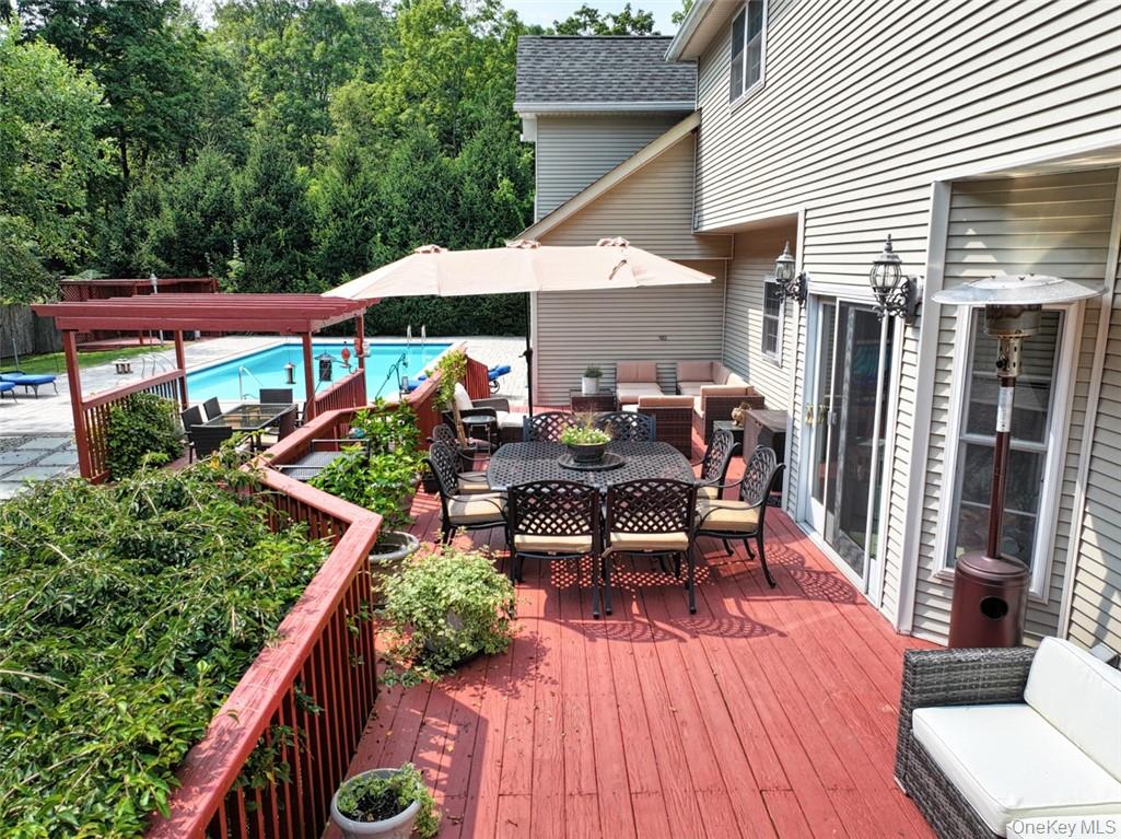 9 Roselawn Road Highland Mills, NY 10930 - Photo 31 of 46 Extra large deck, accessed by 2 sets of sliders (1 set in Kitchen and 1 set in Family Room).