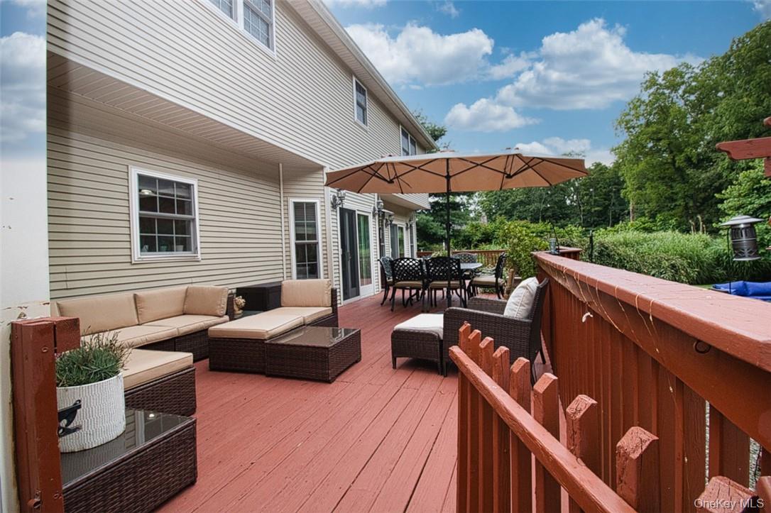 9 Roselawn Road Highland Mills, NY 10930 - Photo 35 of 46 Wooden deck that runs the entire length of house