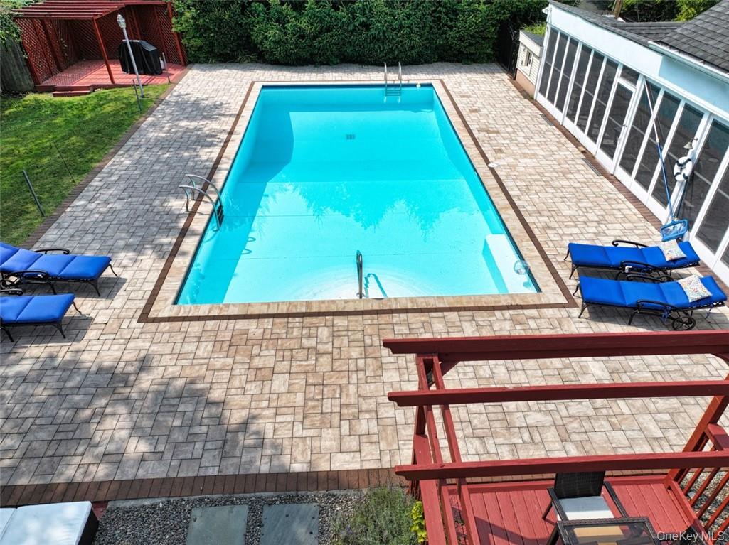 9 Roselawn Road Highland Mills, NY 10930 - Photo 38 of 46 View of swimming pool with a big Pool House on the right of photo. Pool House has recently redecorated bathroom, kitchen, and lounging room.