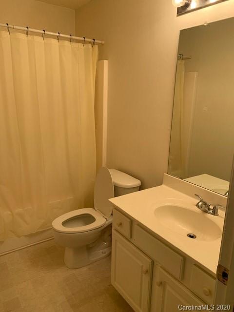 3407 Summerfield Ridge Lane Matthews, NC 28105 - Photo 11 of 11 a bathroom with a sink a toilet and shower