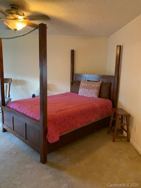 3407 Summerfield Ridge Lane Matthews, NC 28105 - Photo 9 of 11 a bedroom with a bed and window