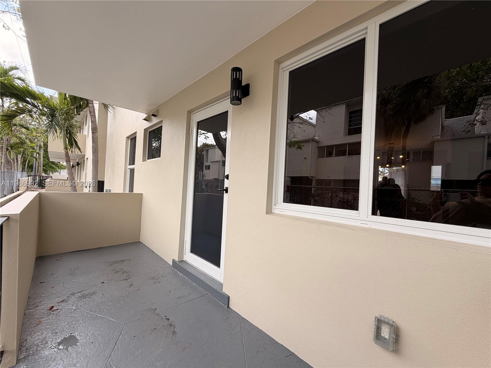1904 Southwest 17th Avenue, Unit 3 Miami, FL 33145 - Photo 15 of 15 a view of a car garage door