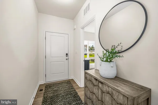 a view of a living room and filled with furniture