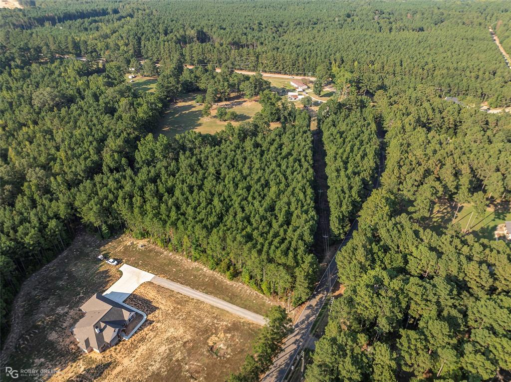 190 Linton Bellevue Road Benton, LA 71006 - Photo 2 of 13 Aerial overview of property's location featuring a heavily wooded area