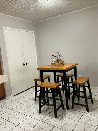 a workspace with furniture and wooden floor