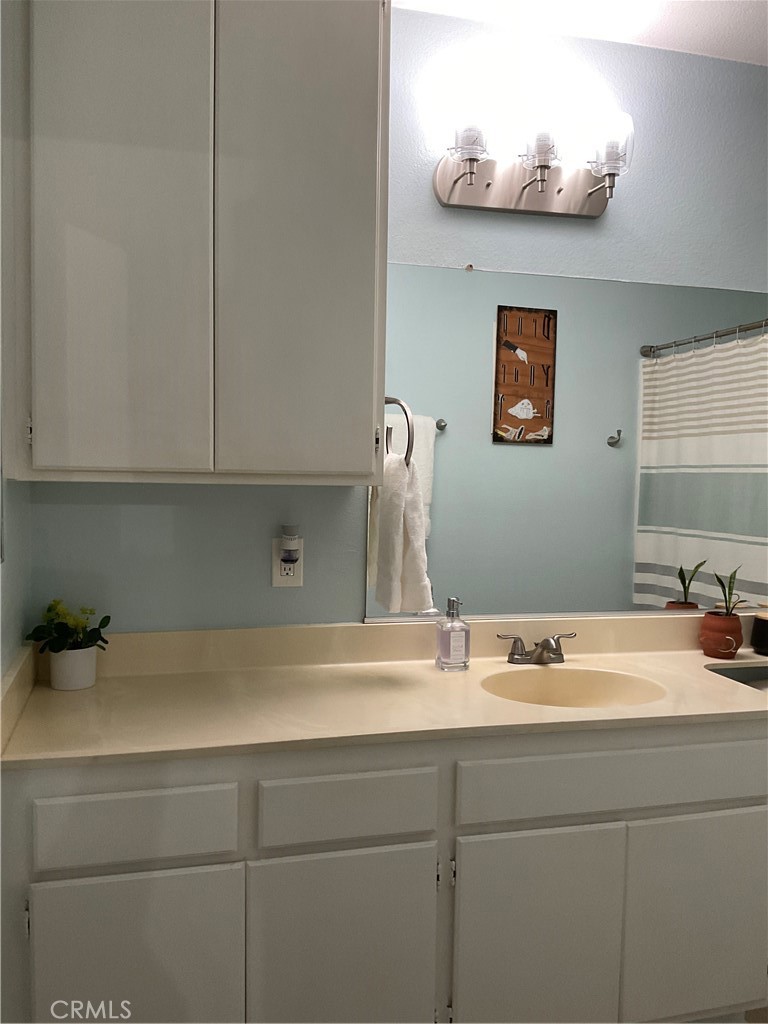 12620 Briarglen Loop, Unit I Stanton, CA 90680 - Photo 31 of 41 a close view of sink and tap