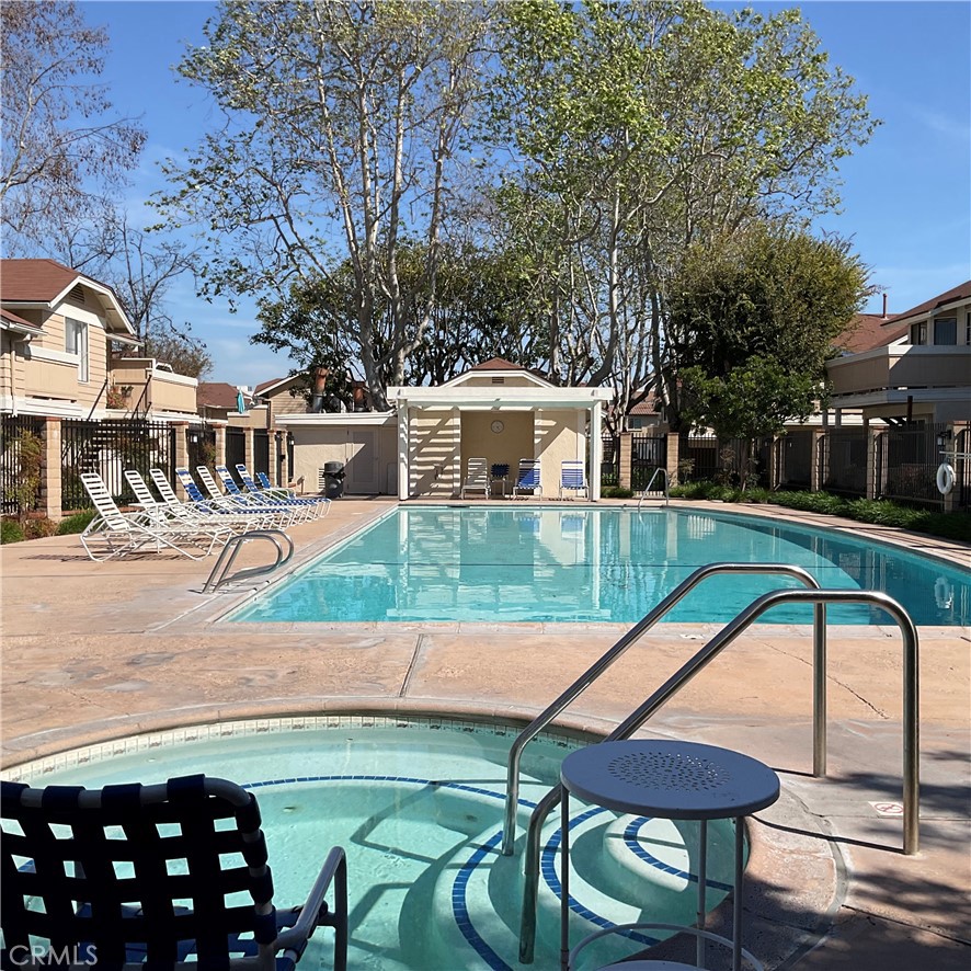12620 Briarglen Loop, Unit I Stanton, CA 90680 - Photo 39 of 41 a view of a swimming pool with a patio