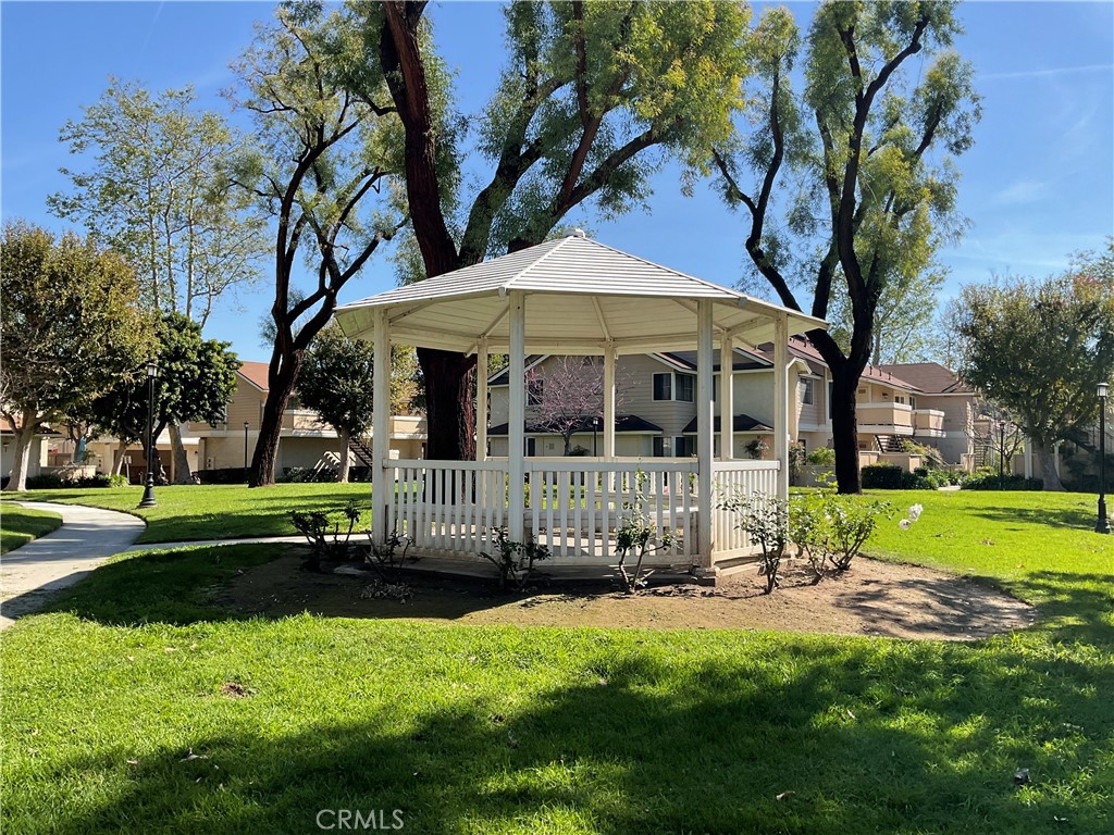 12620 Briarglen Loop, Unit I Stanton, CA 90680 - Photo 40 of 41 a view of a house with backyard and a tree