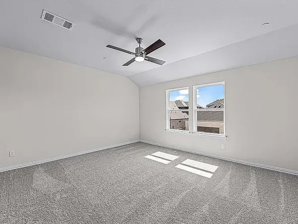 a view of empty room with windows