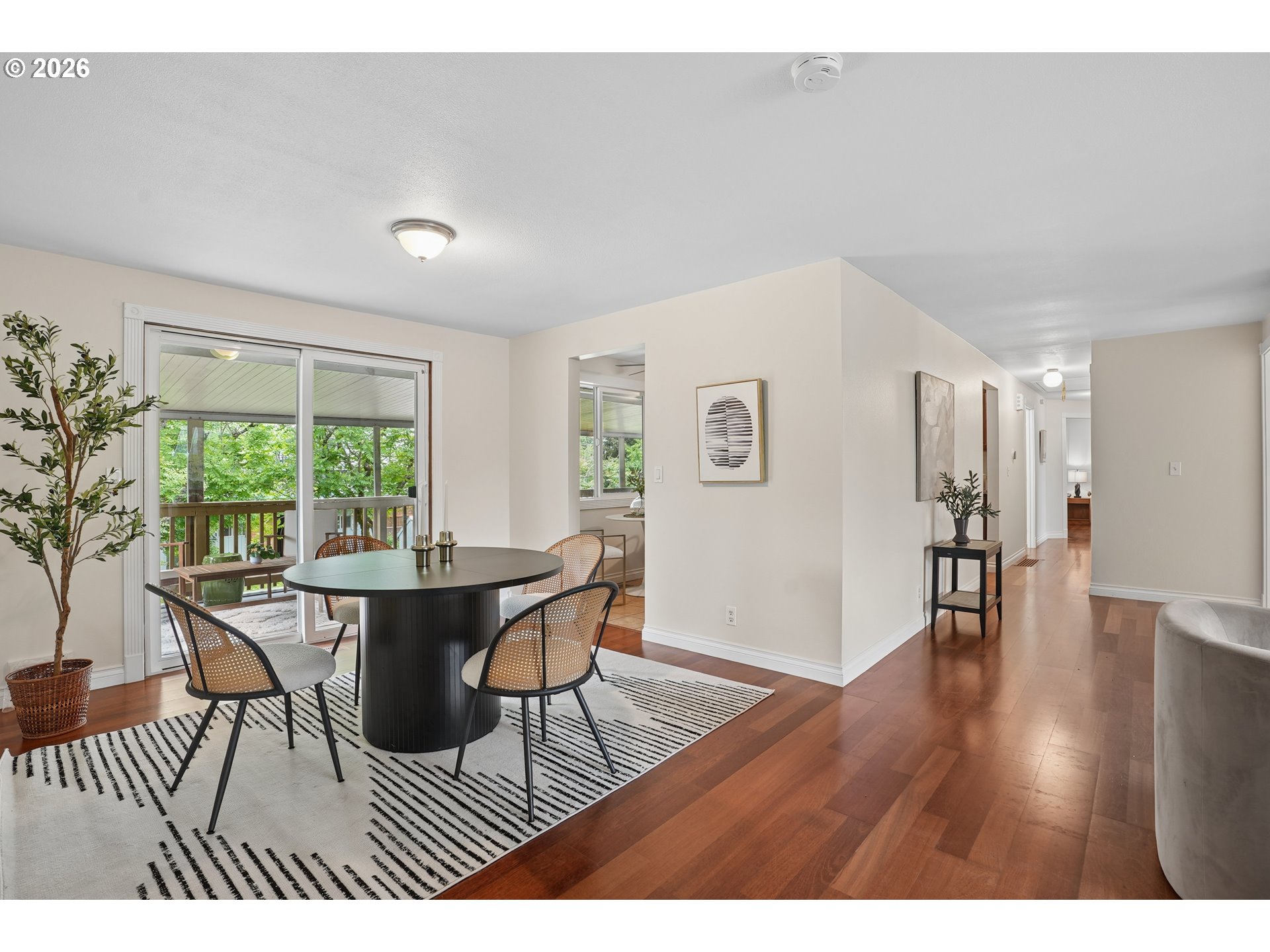 992 South South End Road Oregon City, OR 97045 - Photo 7 of 38 a view of a dining room with furniture and wooden floor