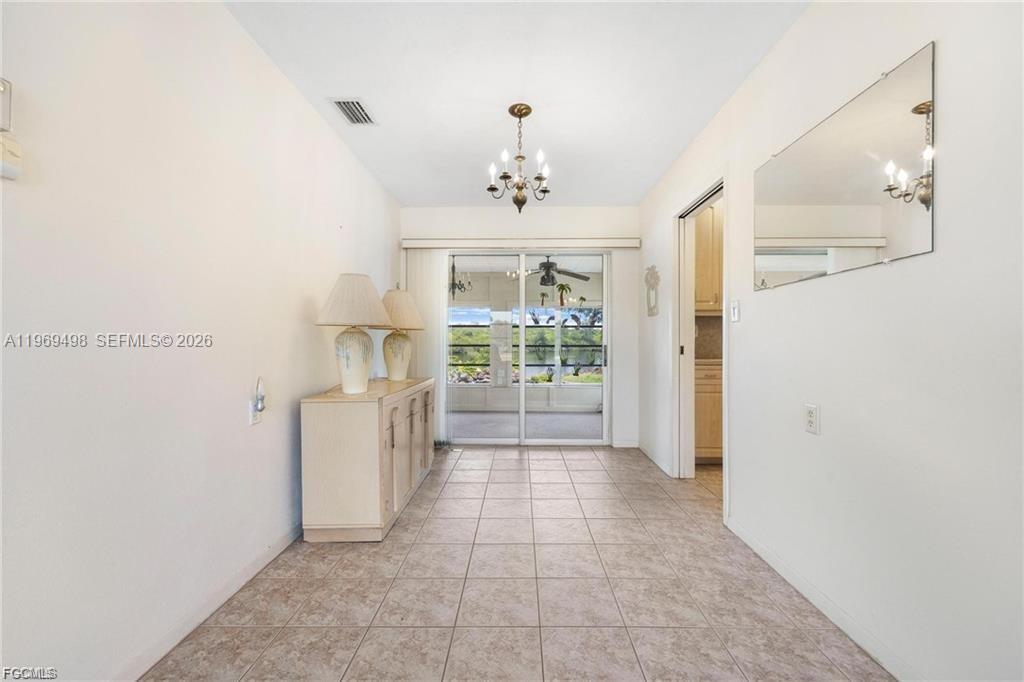 2030 Fort Denaud Road LaBelle, FL 33935 - Photo 14 of 25 a view of a kitchen with a sink and dishwasher with white walls