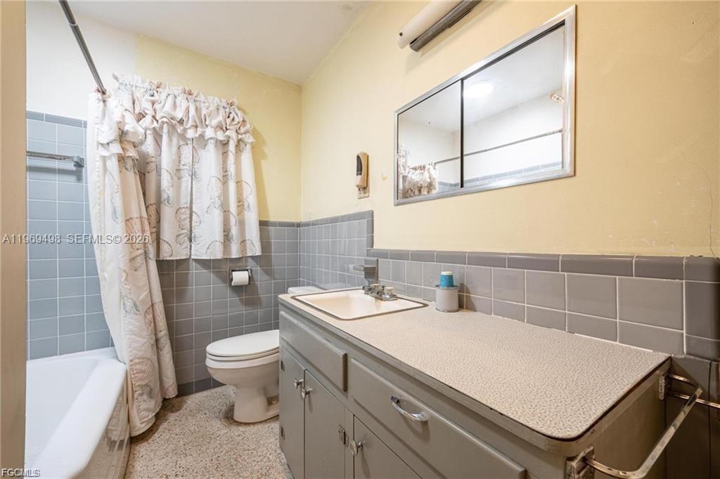 2030 Fort Denaud Road LaBelle, FL 33935 - Photo 21 of 25 a bathroom with a sink toilet and shower