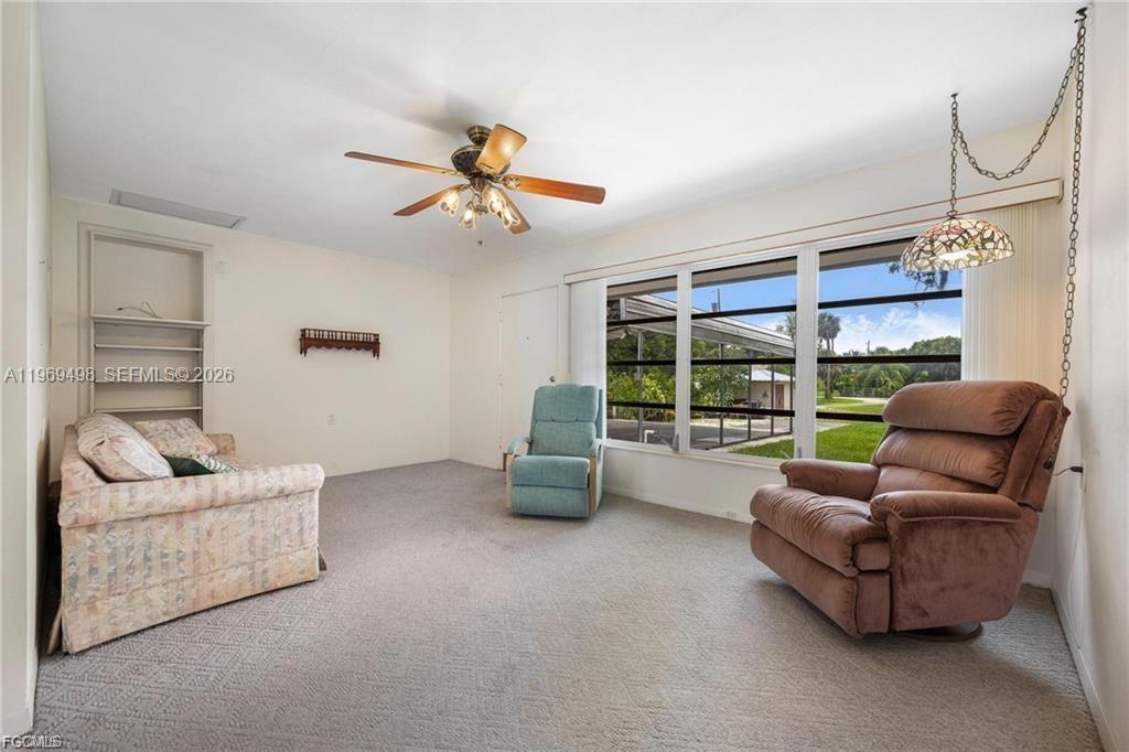 2030 Fort Denaud Road LaBelle, FL 33935 - Photo 10 of 25 a living room with furniture and a large window
