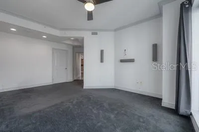 a view of an empty room and window