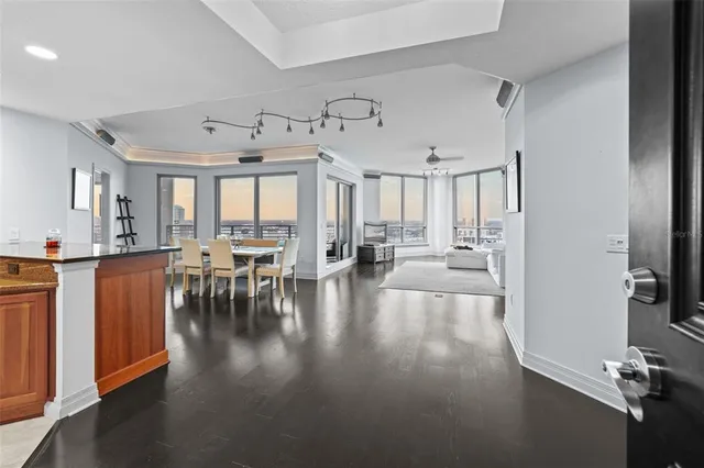 a view of a livingroom with furniture hardwood floor and a view of living room