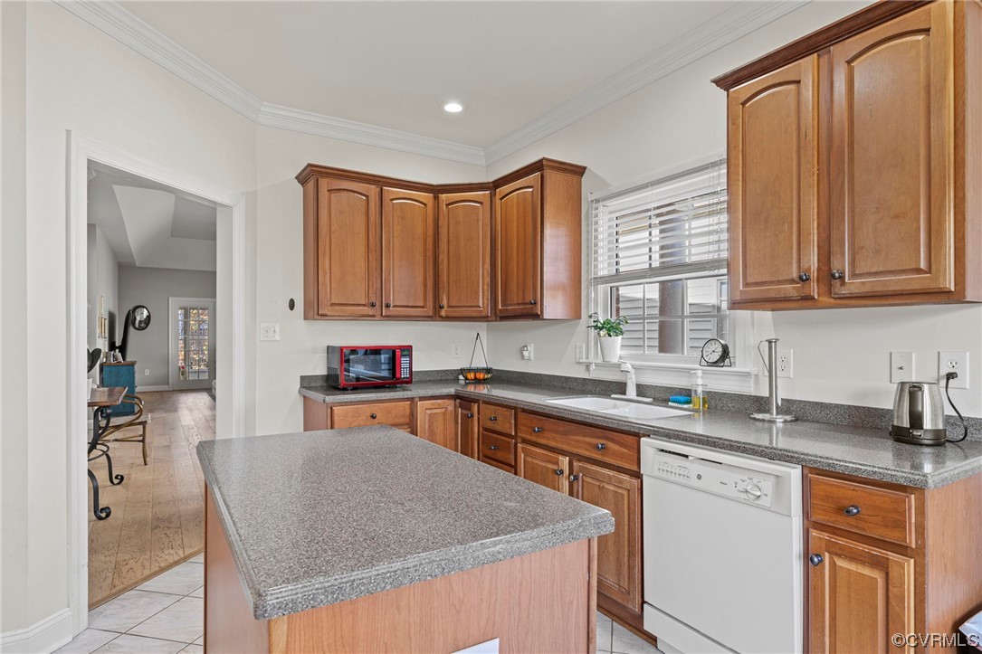 5124 Park Commons Loop Glen Allen, VA 23059 - Photo 12 of 30 a kitchen with stainless steel appliances granite countertop wooden cabinets a sink and dishwasher a stove with wooden floor