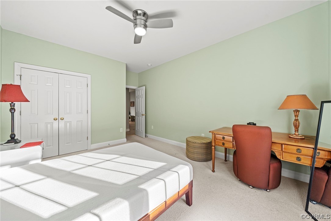 5124 Park Commons Loop Glen Allen, VA 23059 - Photo 18 of 30 a bedroom with a bed and a chandelier