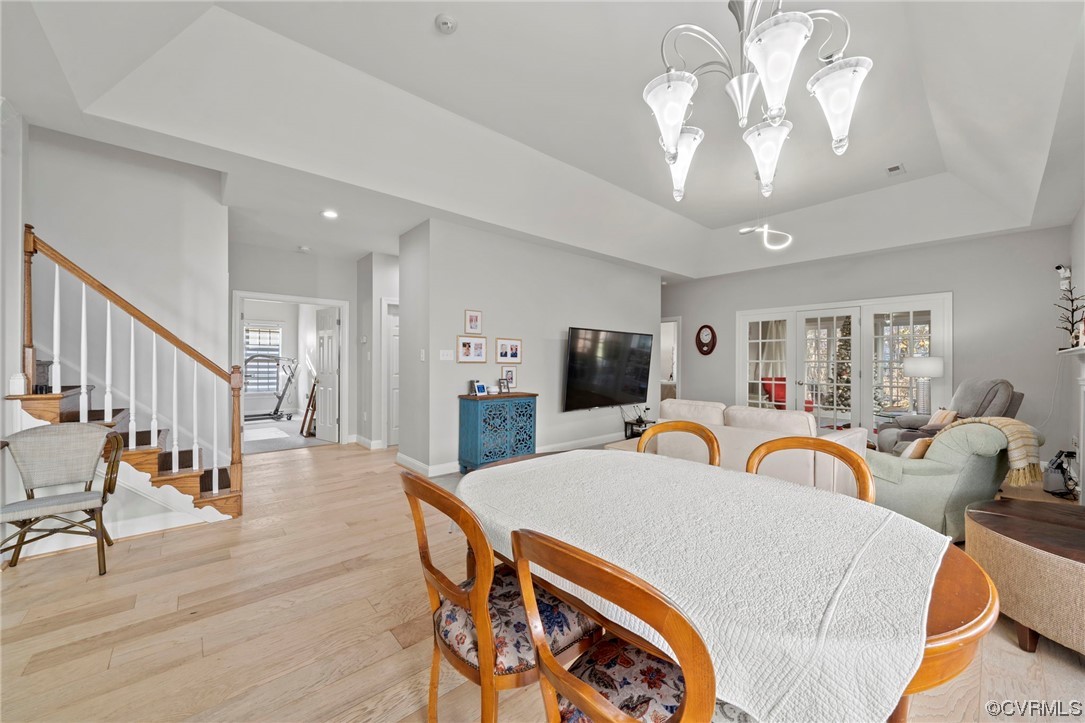5124 Park Commons Loop Glen Allen, VA 23059 - Photo 3 of 30 a view of a dining room with furniture and wooden floor