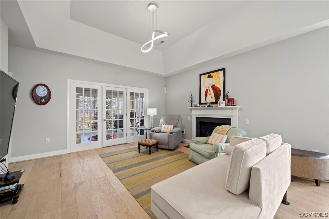 5124 Park Commons Loop Glen Allen, VA 23059 - Photo 6 of 30 a living room with furniture a fireplace and a flat screen tv