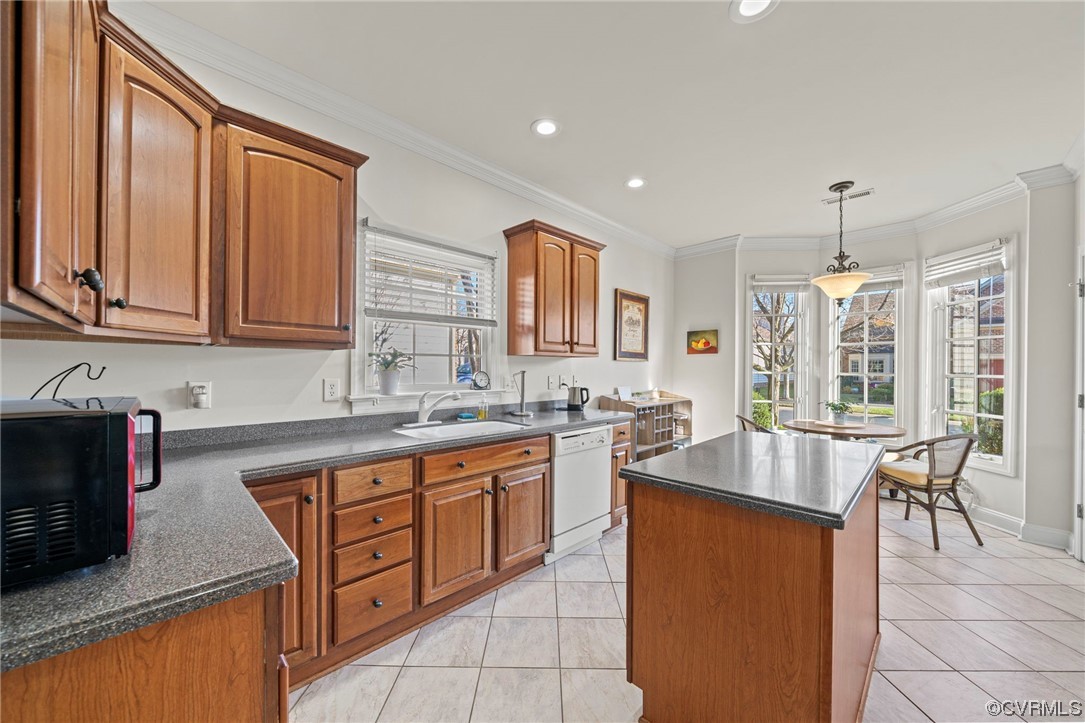 5124 Park Commons Loop Glen Allen, VA 23059 - Photo 9 of 30 a kitchen with stainless steel appliances granite countertop a sink stove and cabinets