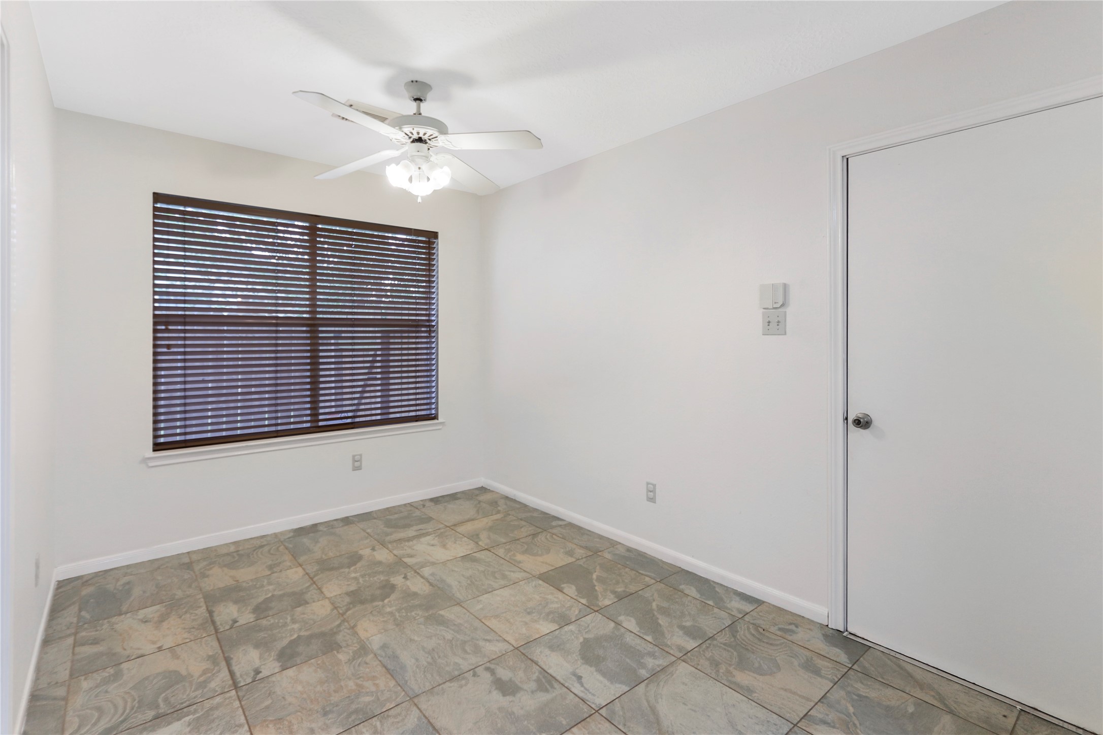 3226 Mourning Dove Drive Spring, TX 77388 - Photo 11 of 17 a view of an empty room with a window