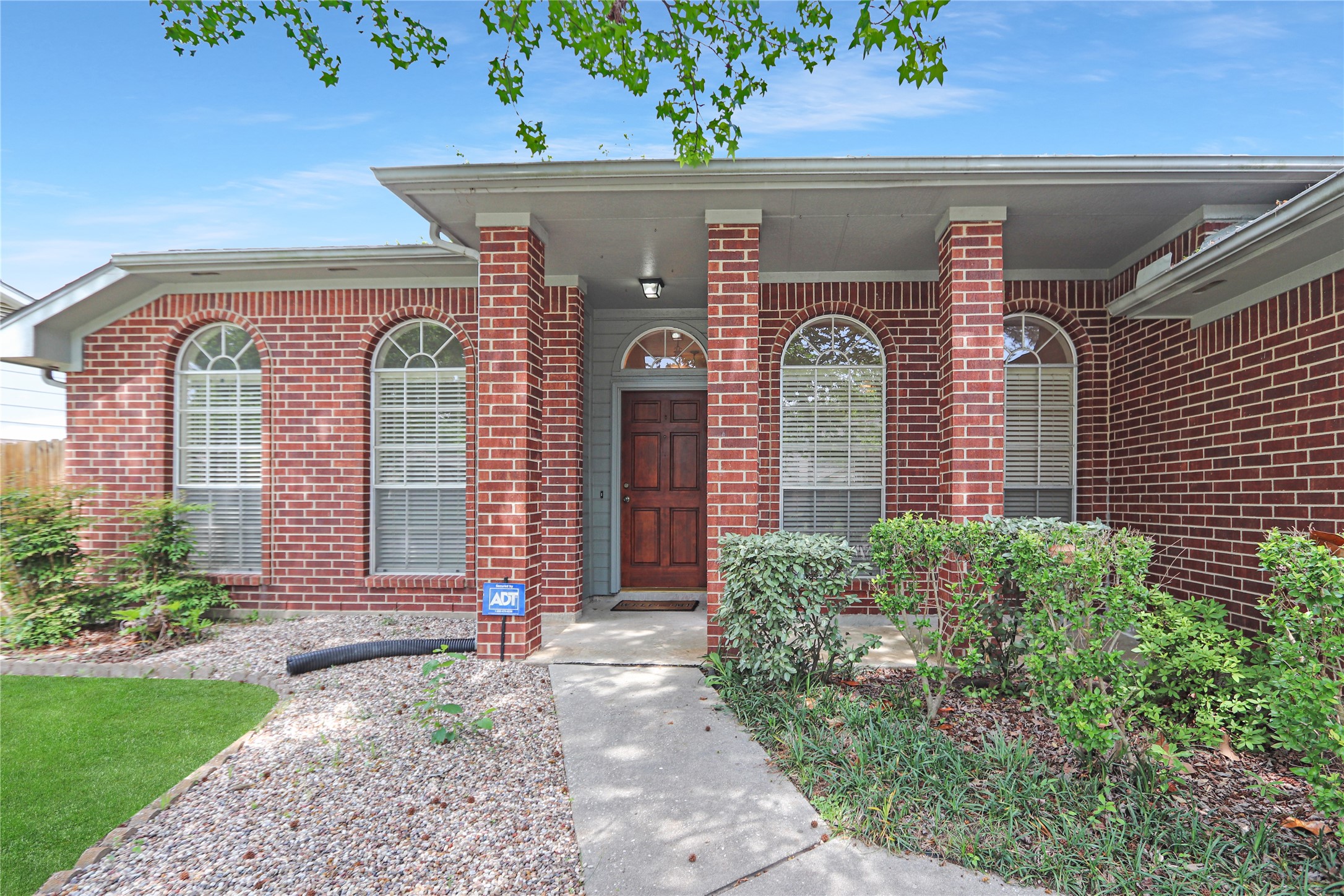 3226 Mourning Dove Drive Spring, TX 77388 - Photo 2 of 17 a front view of a house with garden
