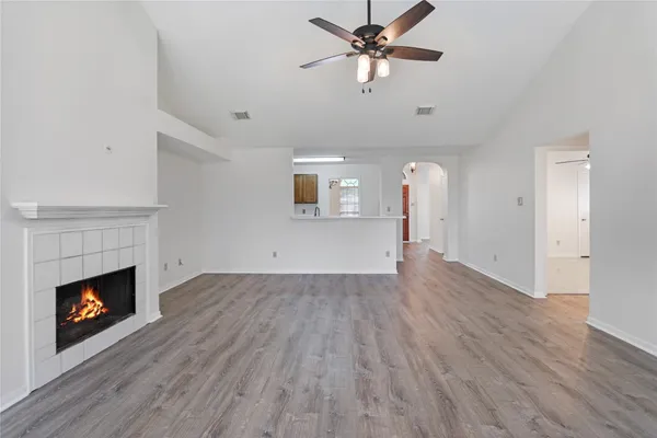a view of an empty room with a window