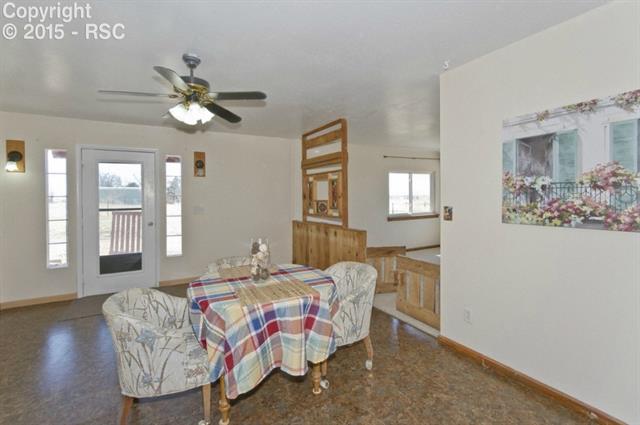 17135 Finch Road Colorado Springs, CO 80928 - Photo 25 of 36 Entrance to secondary home leads to the dining room.
