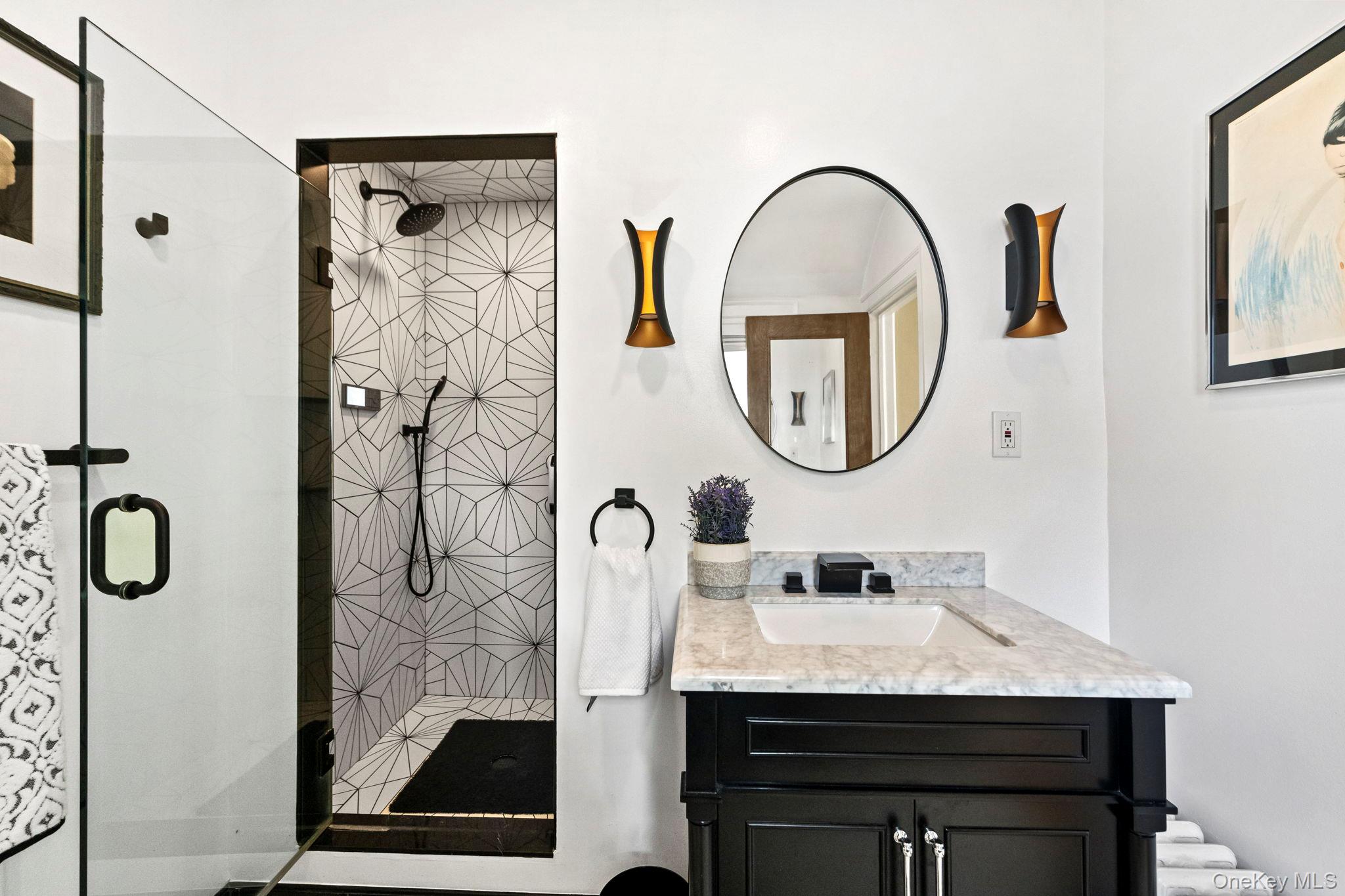 44 Fenimore Road New Rochelle, NY 10804 - Photo 29 of 46 a bathroom with a sink and a mirror