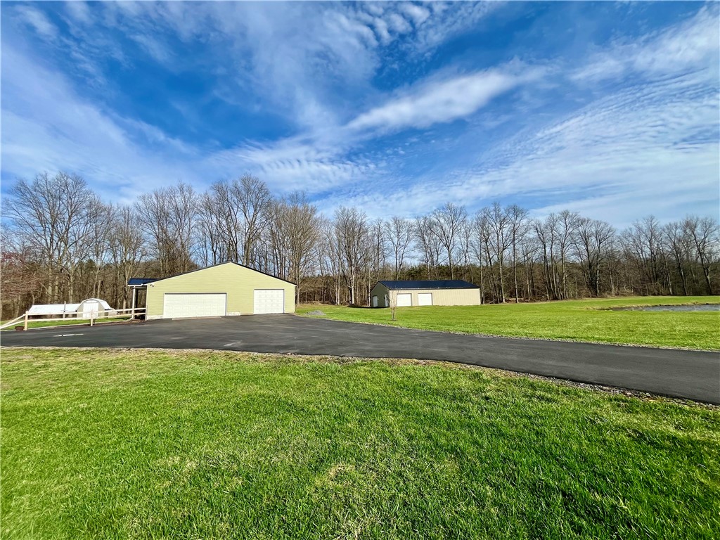 1452 State Route Sterling, NY 13156 - Photo 7 of 42 3 car detached garage, paved driveway
