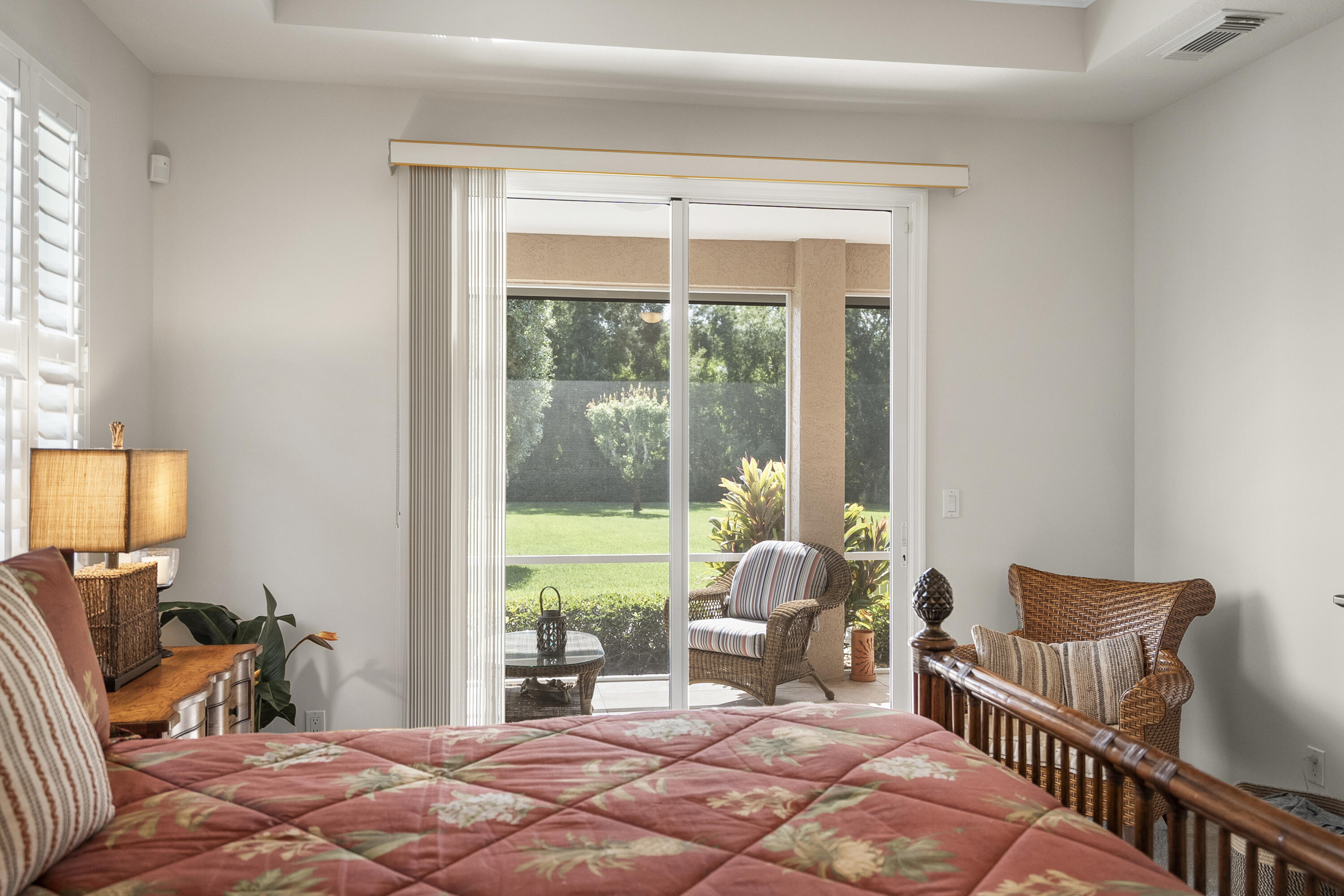 1234 Southwest Locks Road Stuart, FL 34997 - Photo 13 of 53 a bedroom with furniture and a large window