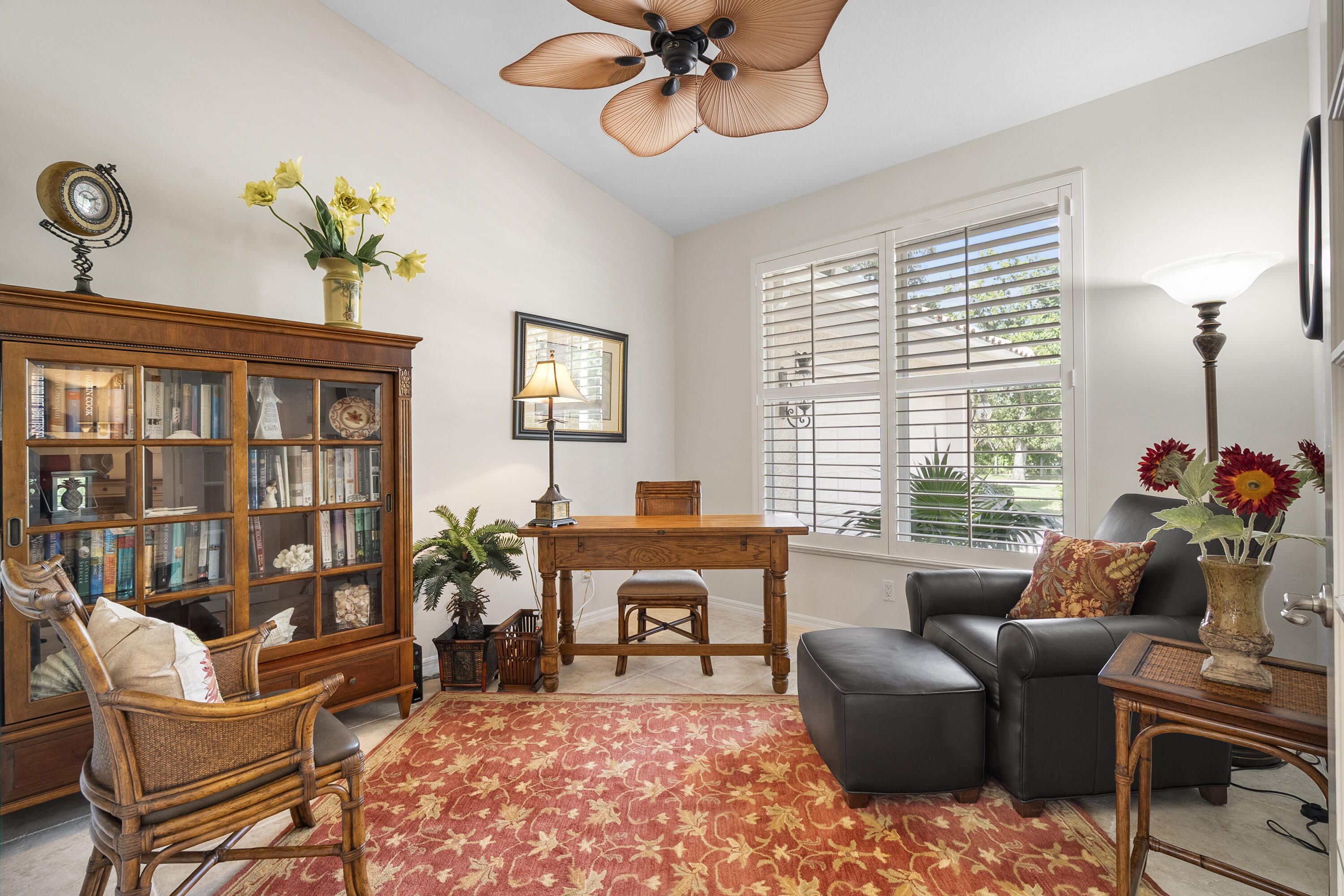 1234 Southwest Locks Road Stuart, FL 34997 - Photo 20 of 53 a living room with furniture a chandelier and a window