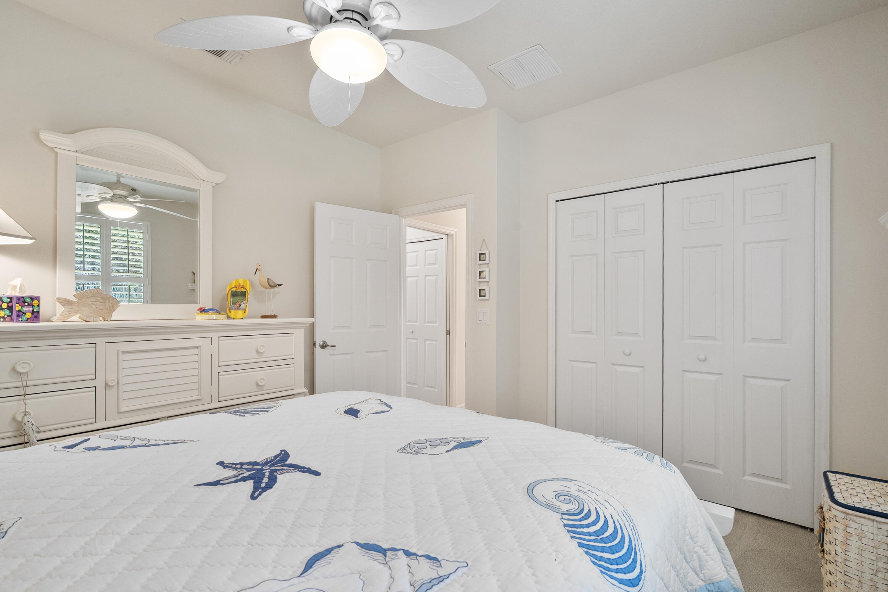 1234 Southwest Locks Road Stuart, FL 34997 - Photo 24 of 53 a room with a sink a chandelier and a mirror