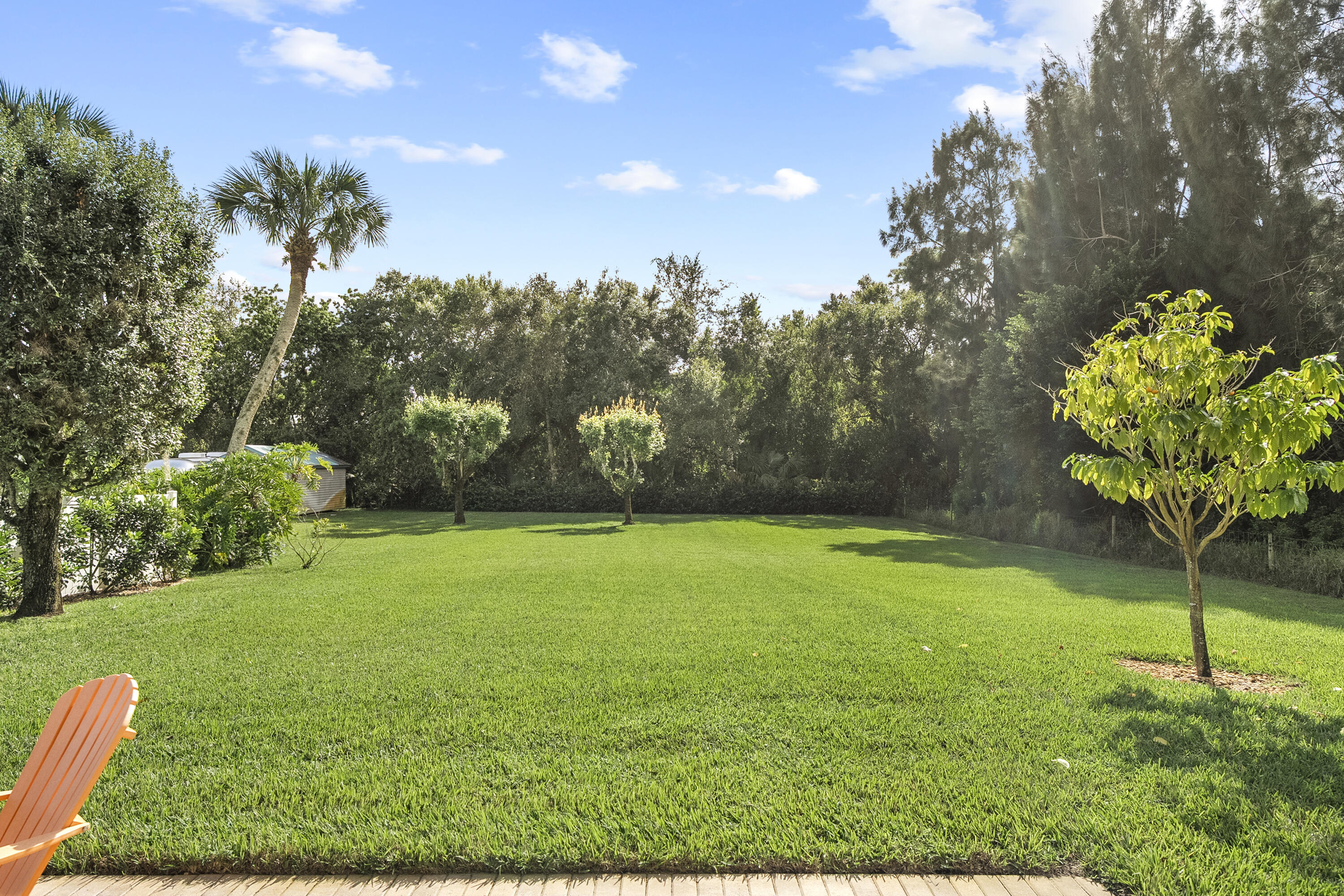 1234 Southwest Locks Road Stuart, FL 34997 - Photo 32 of 53 a view of a garden with a slide