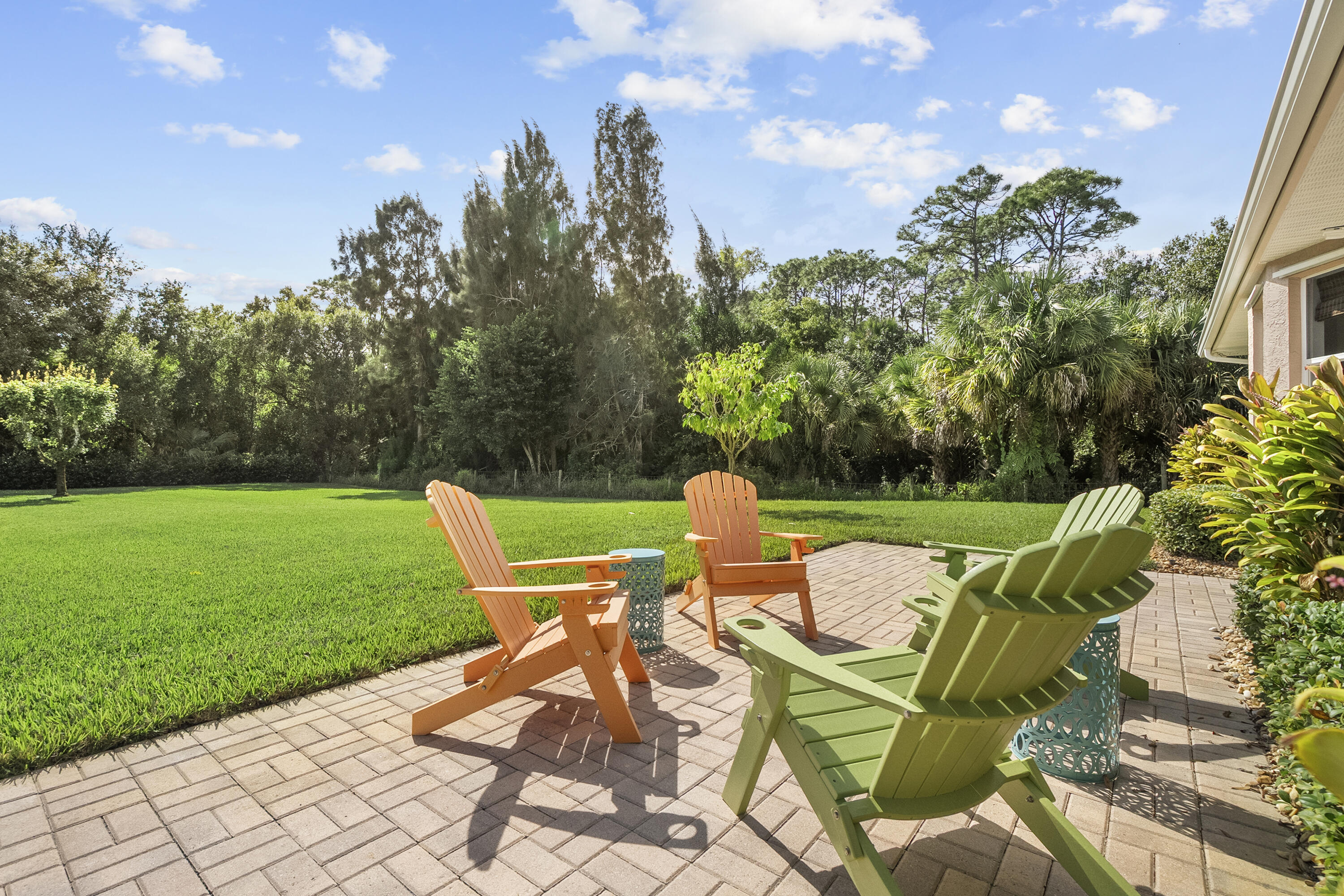 1234 Southwest Locks Road Stuart, FL 34997 - Photo 33 of 53 a view of a chairs and table on the garden