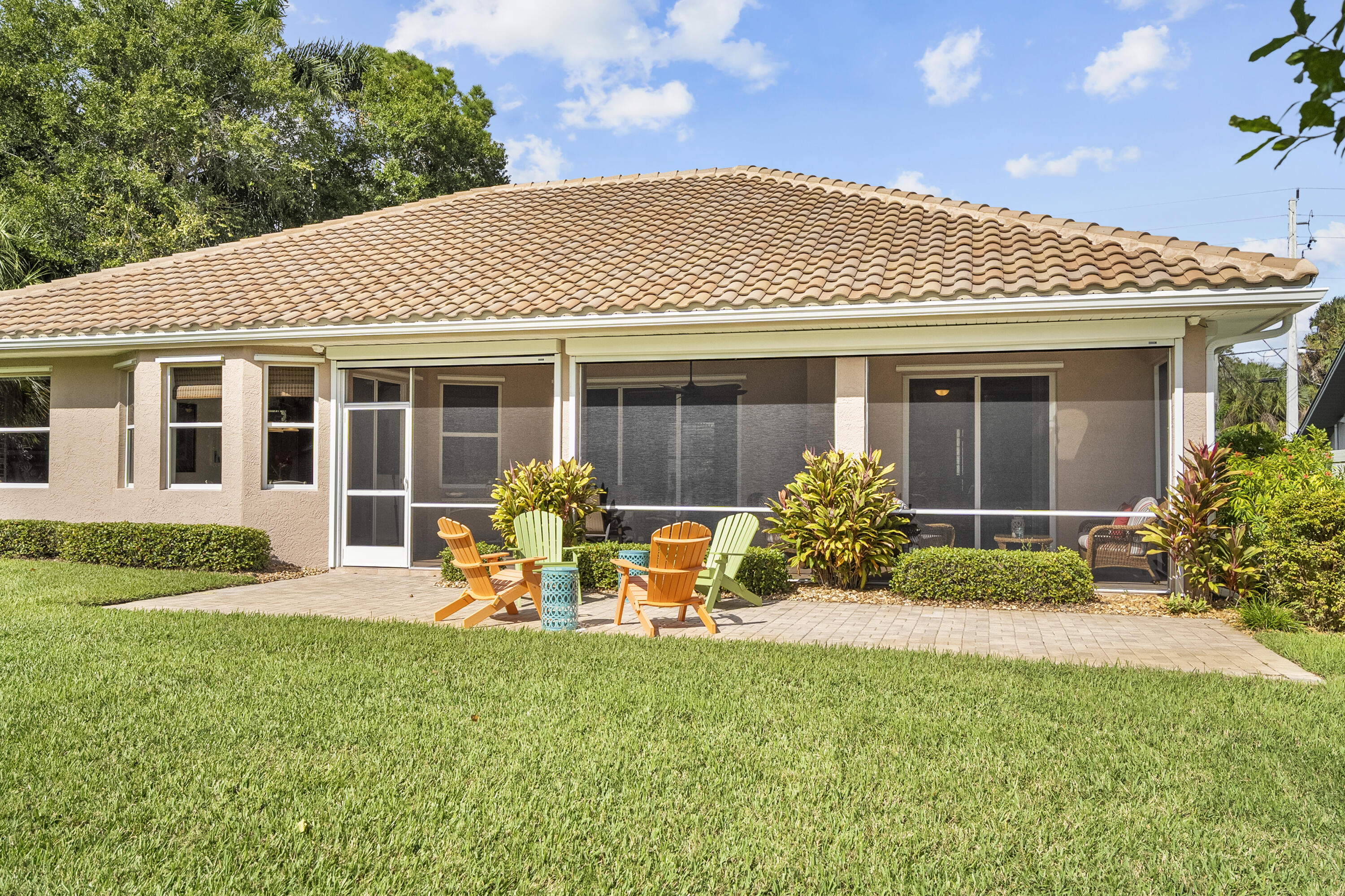 1234 Southwest Locks Road Stuart, FL 34997 - Photo 34 of 53 a front view of a house with garden