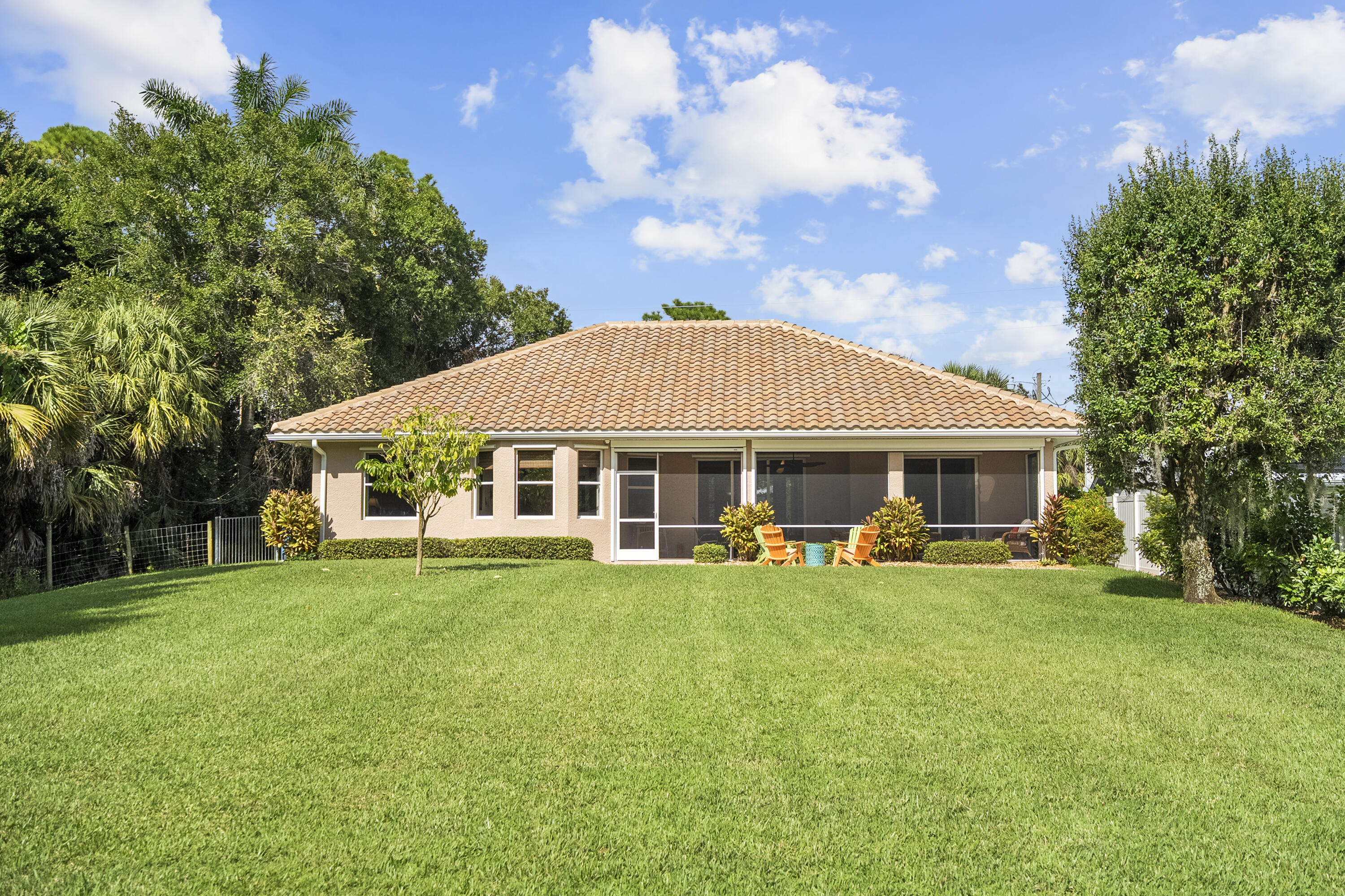 1234 Southwest Locks Road Stuart, FL 34997 - Photo 37 of 53 a view of a house with a yard