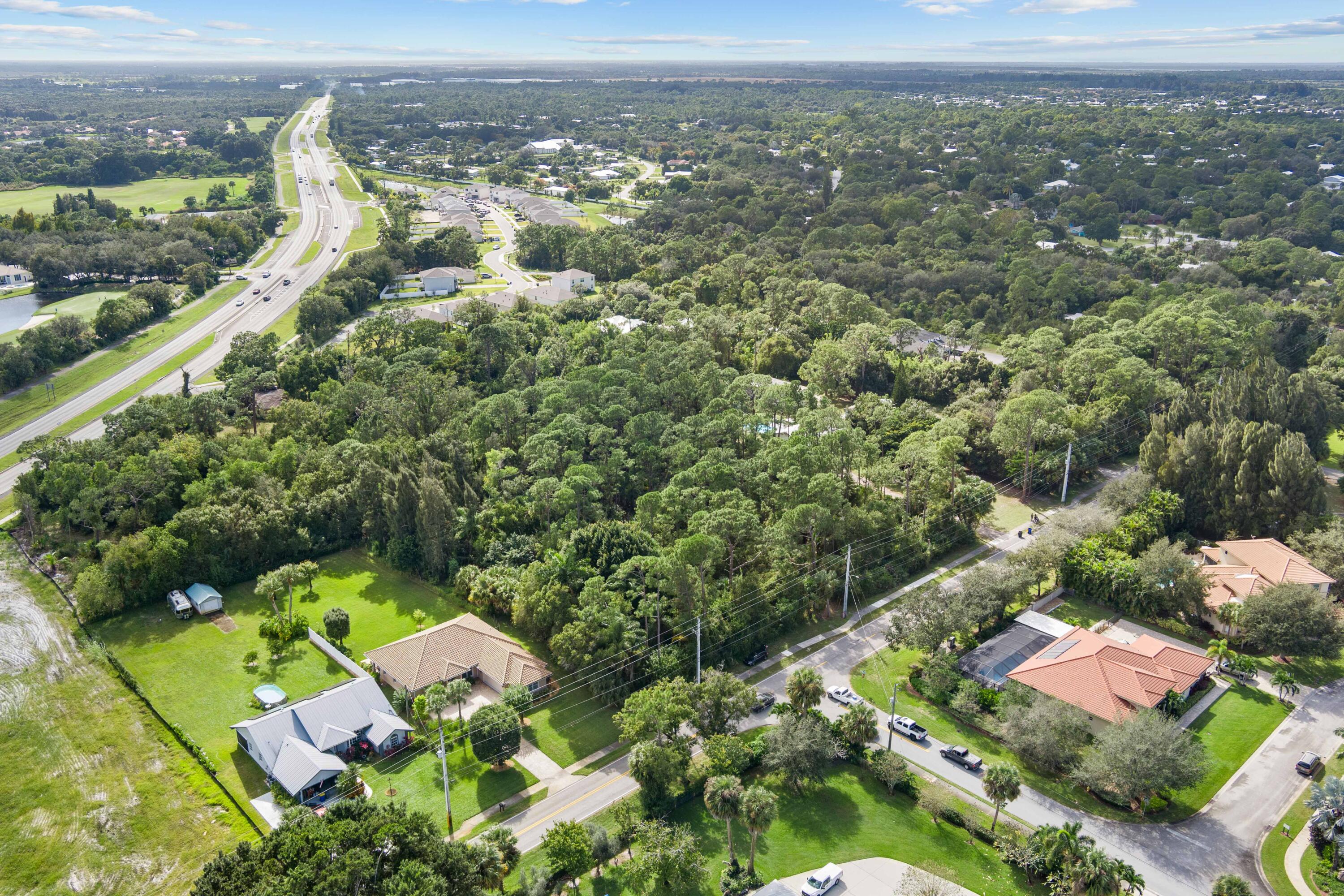 1234 Southwest Locks Road Stuart, FL 34997 - Photo 48 of 53 an aerial view of residential houses with outdoor space